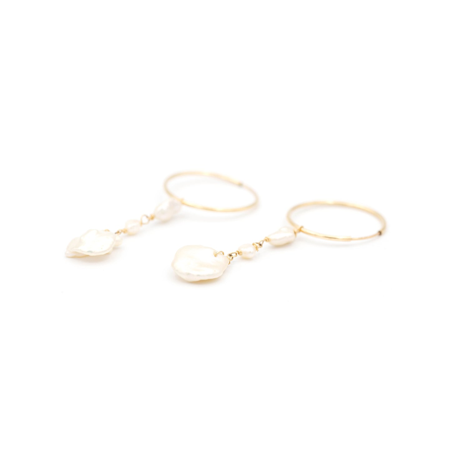 
                  
                    White Keshi Pearl Earrings
                  
                