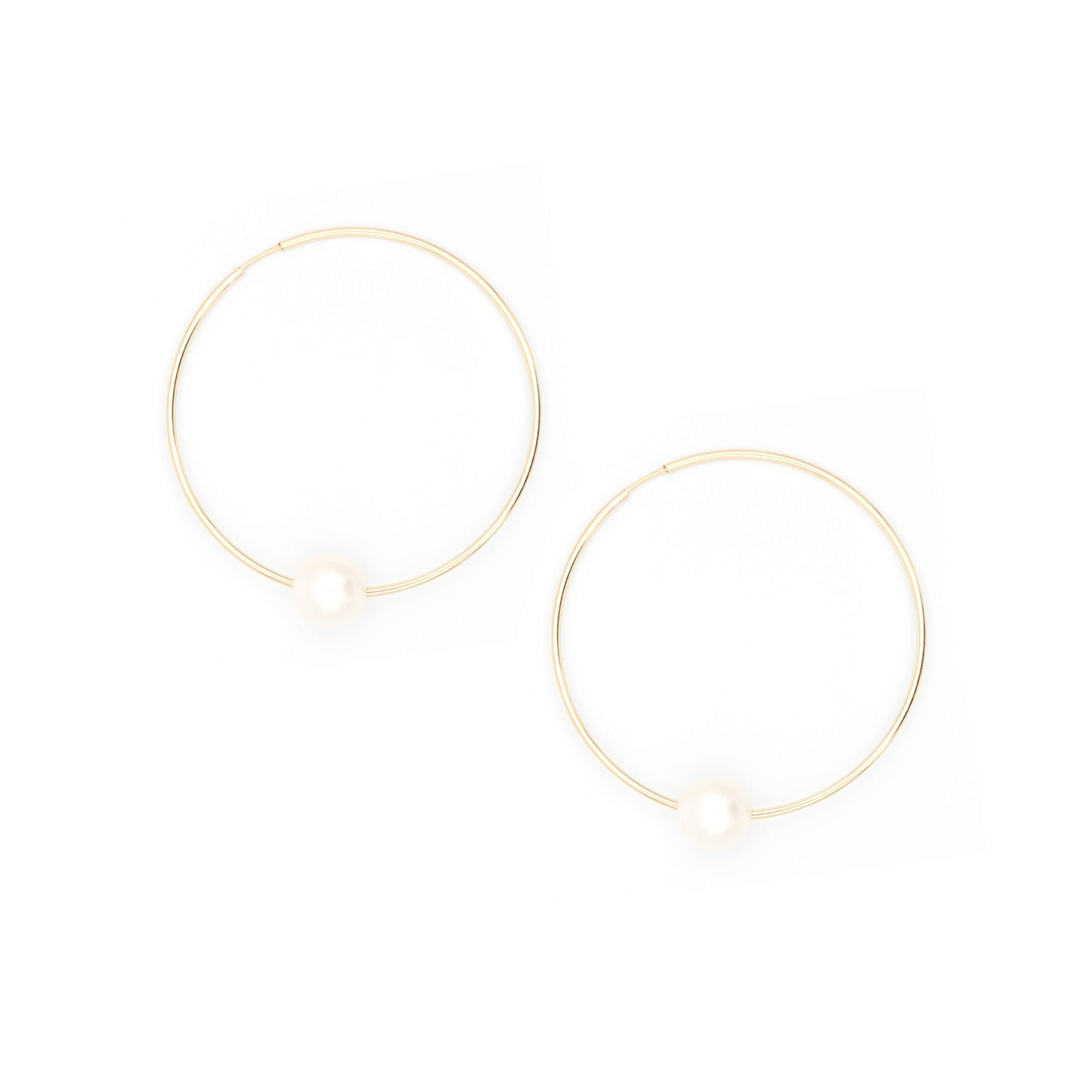 
                  
                    White Pearl Hoop Earrings 50 mm
                  
                