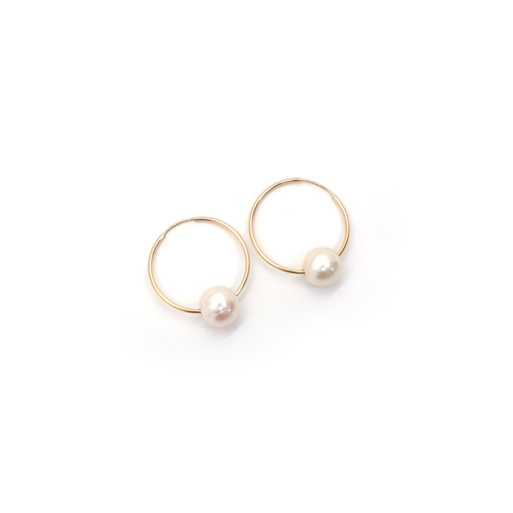 
                  
                    White Pearl Hoop Earrings 30 mm
                  
                