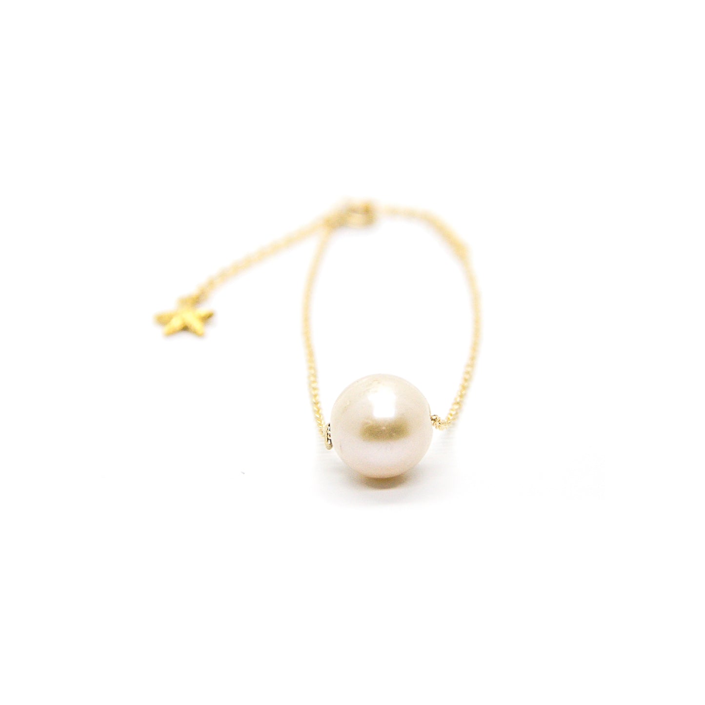 
                  
                    White Pearl Bracelet
                  
                