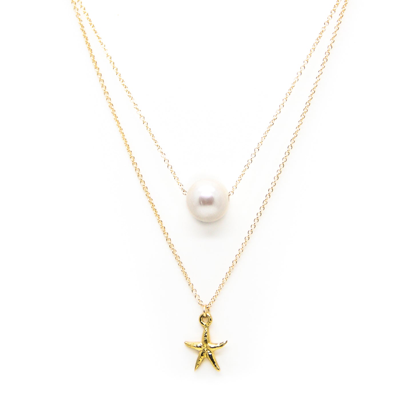 
                  
                    White Pearl and Starfish
                  
                