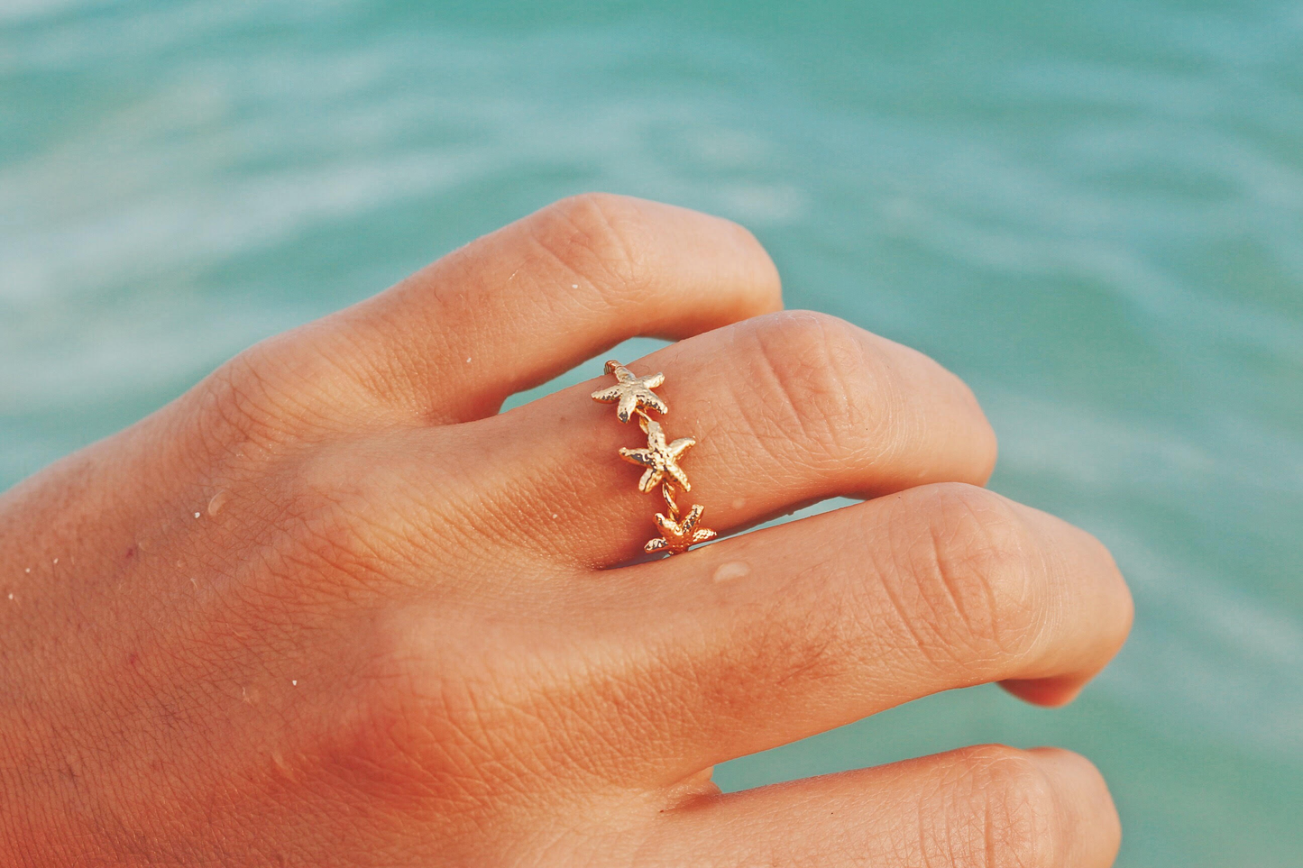 
                  
                    Three Starfish Ring
                  
                